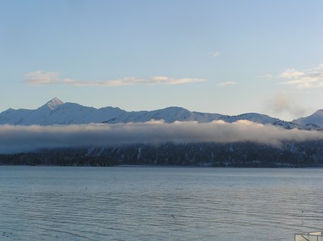 Mountains behind a cloud layer