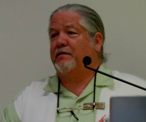Mark Armitage giving a talk at a meeting of the Creation Science Fellowship.  (click for source)