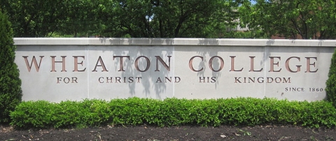 This sign contains the English translation of Wheaton College's motto, "Christo et Regno Ejus."  (click for credit)