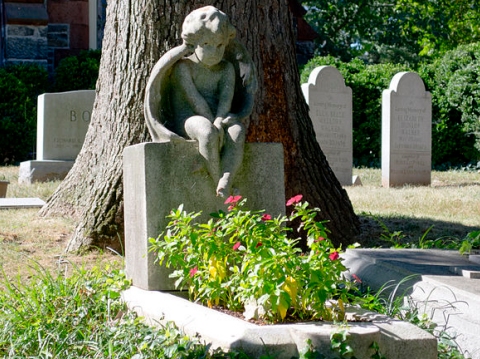 A child's grave at Oak Hill Cemetery, which is in Washington, D.C.  (click for credit)