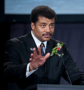 Neil deGrasse Tyson speaking as host at the Apollo 40th anniversary celebration held at the National Air and Space Museum. (click for credit)