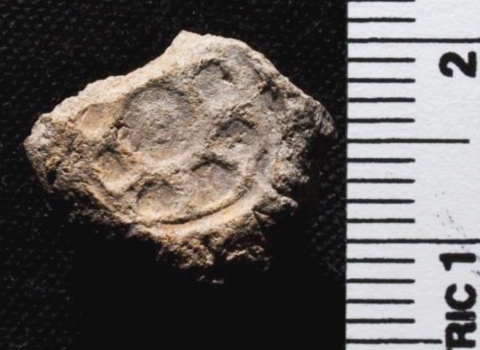 This bulla (a clay seal) and five others were found in a 10th-century BC village near what was the border between Judah and the land of the Philistines.  The ruler in the photo is marked off in centimeters.  (click for credit)