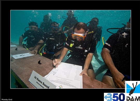 This is a picture of the Maldives cabinet meeting that took place on October 17th, 2009.  (click for credit)